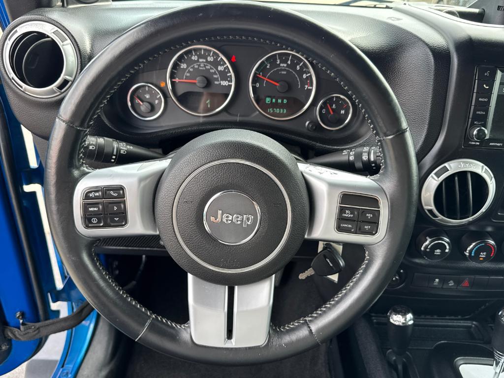 used 2014 Jeep Wrangler Unlimited car, priced at $13,988