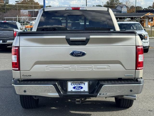 used 2018 Ford F-150 car, priced at $27,318