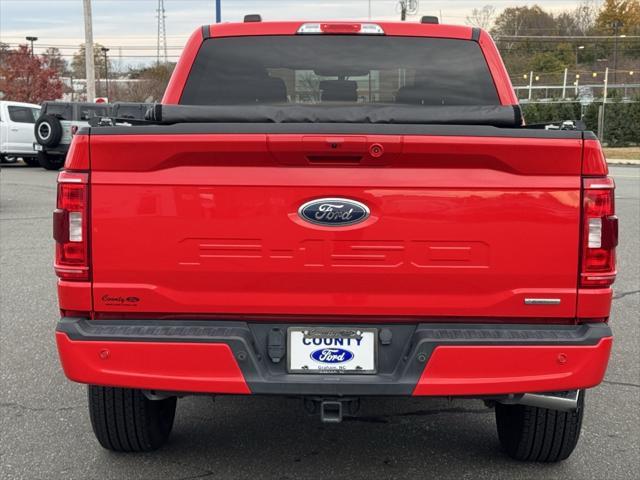 used 2021 Ford F-150 car, priced at $34,998