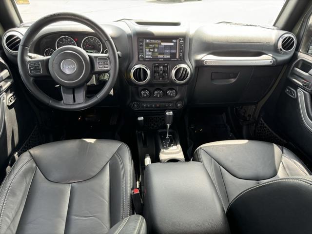 used 2015 Jeep Wrangler Unlimited car, priced at $17,510