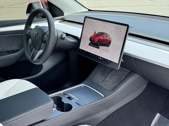 used 2024 Tesla Model Y car, priced at $34,644