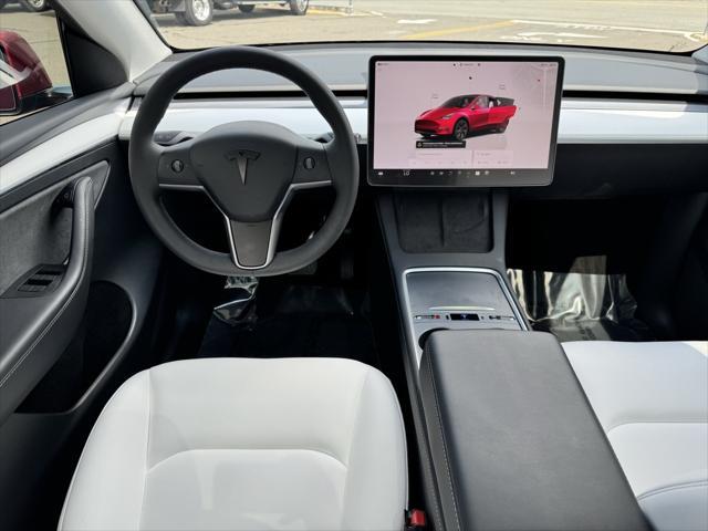 used 2024 Tesla Model Y car, priced at $34,644