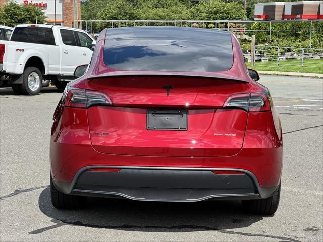 used 2024 Tesla Model Y car, priced at $34,644