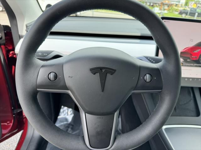 used 2024 Tesla Model Y car, priced at $34,644