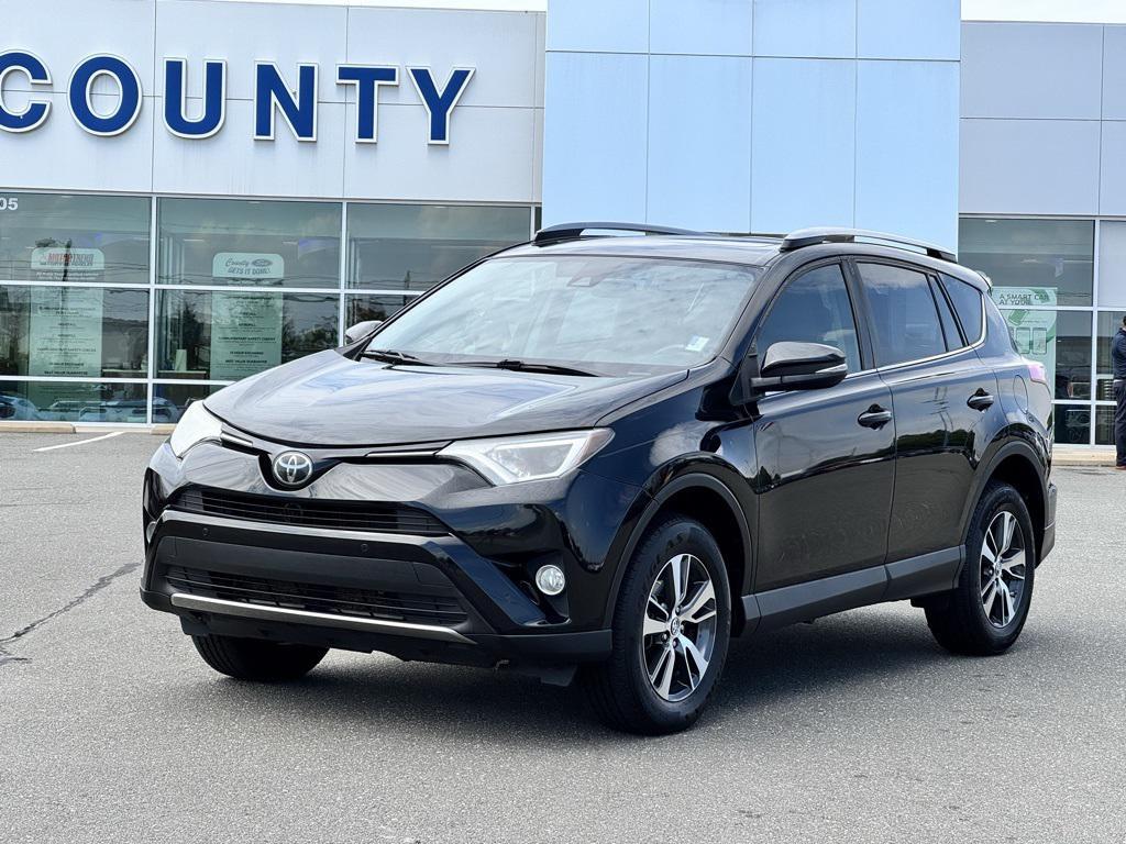 used 2018 Toyota RAV4 car, priced at $13,998