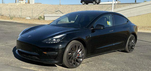 used 2022 Tesla Model 3 car, priced at $26,900