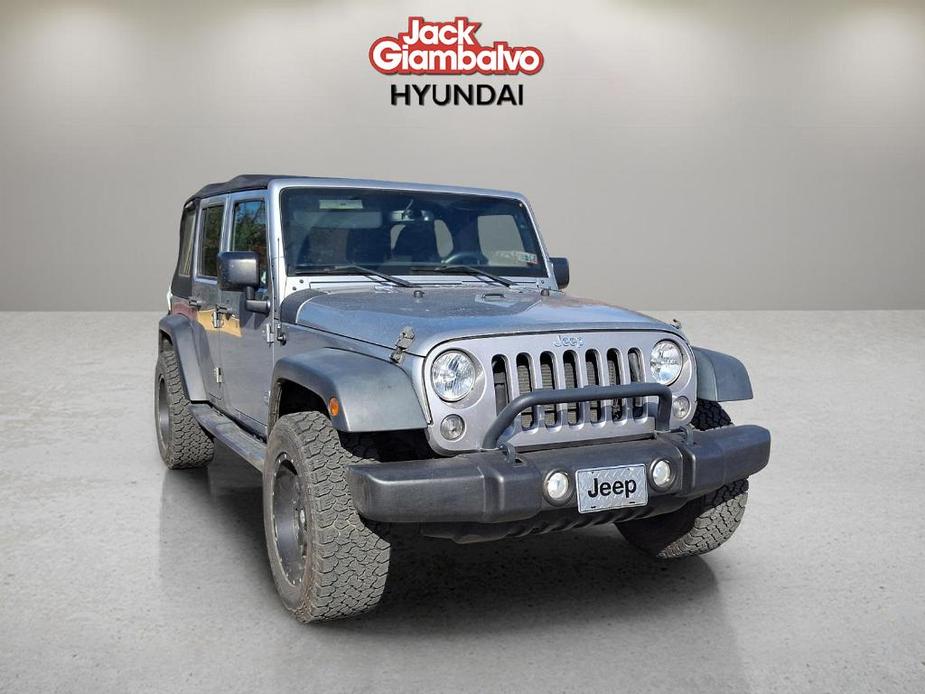 used 2015 Jeep Wrangler Unlimited car, priced at $17,990