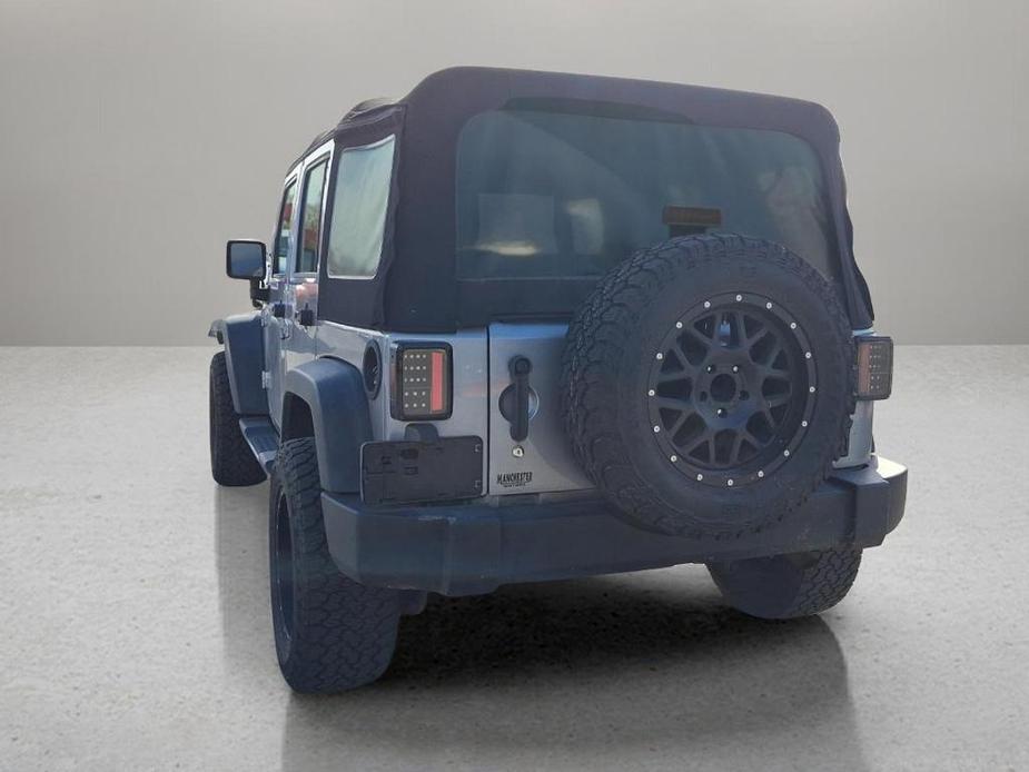 used 2015 Jeep Wrangler Unlimited car, priced at $17,990