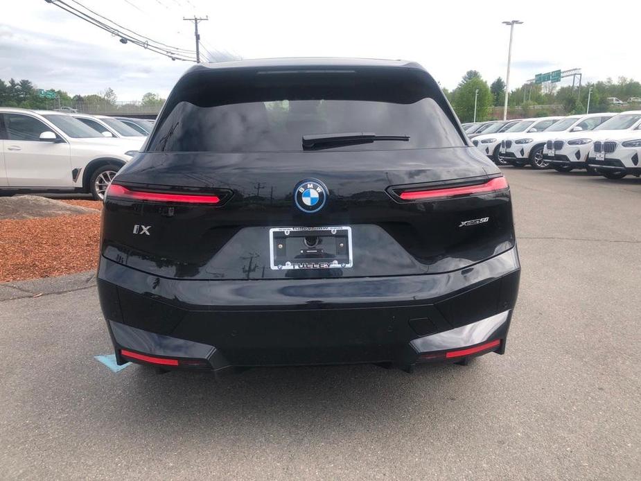 new 2025 BMW iX car, priced at $90,745