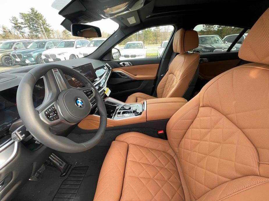 new 2025 BMW X6 car, priced at $84,255