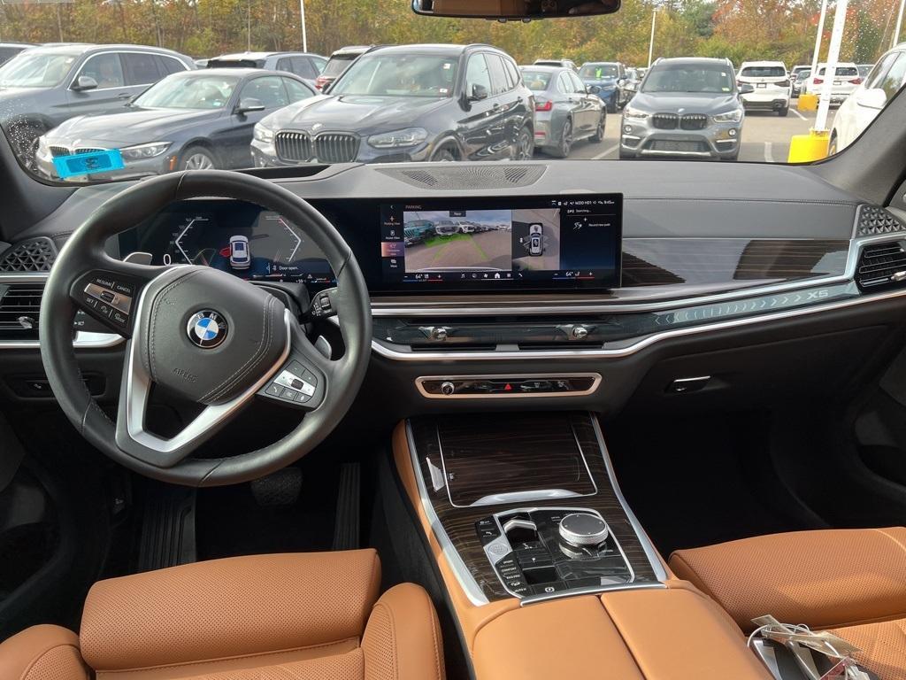 used 2025 BMW X5 car, priced at $64,882