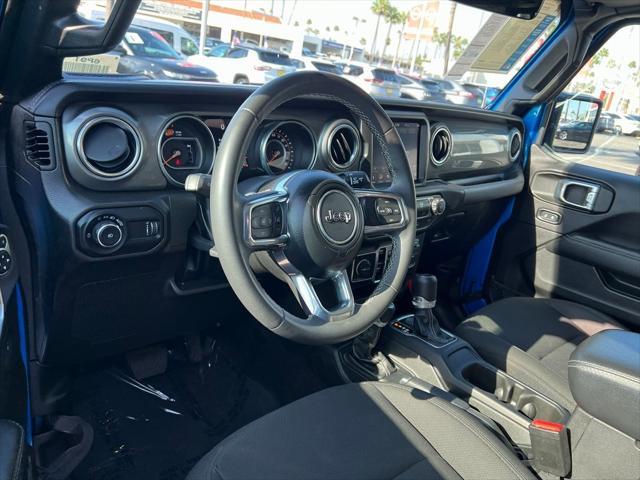 used 2023 Jeep Wrangler car, priced at $30,316