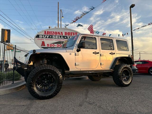 used 2012 Jeep Wrangler Unlimited car, priced at $17,999