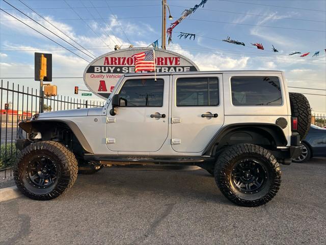 used 2012 Jeep Wrangler Unlimited car, priced at $17,999