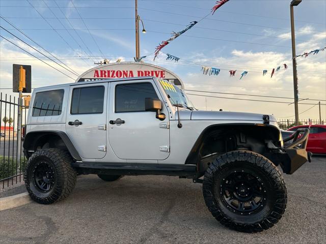 used 2012 Jeep Wrangler Unlimited car, priced at $17,999