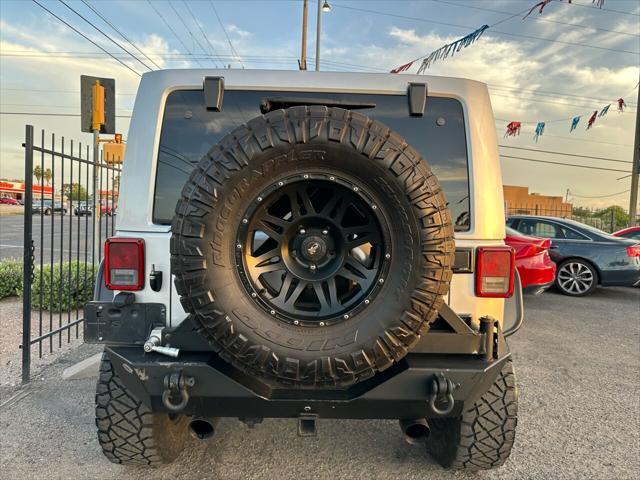 used 2012 Jeep Wrangler Unlimited car, priced at $17,999