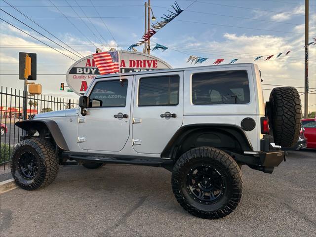 used 2012 Jeep Wrangler Unlimited car, priced at $17,999