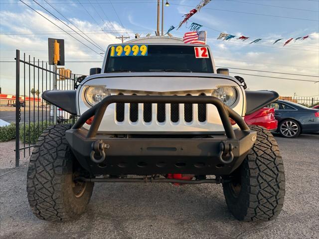 used 2012 Jeep Wrangler Unlimited car, priced at $17,999