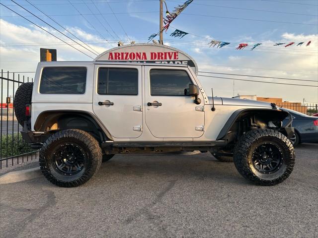 used 2012 Jeep Wrangler Unlimited car, priced at $17,999