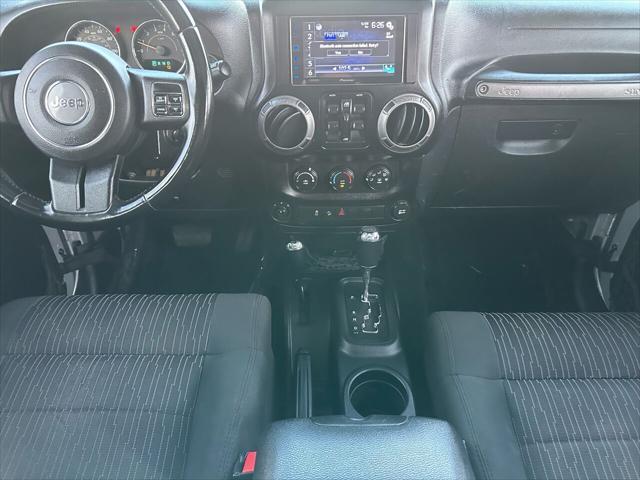 used 2012 Jeep Wrangler Unlimited car, priced at $17,999