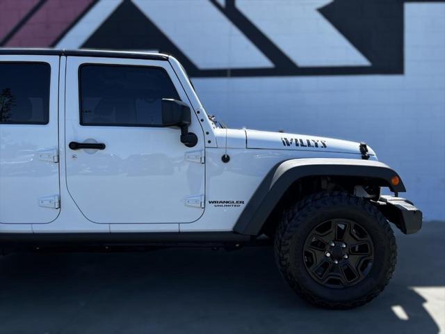 used 2016 Jeep Wrangler Unlimited car, priced at $18,491