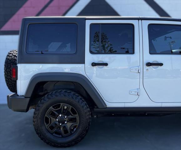 used 2016 Jeep Wrangler Unlimited car, priced at $18,491