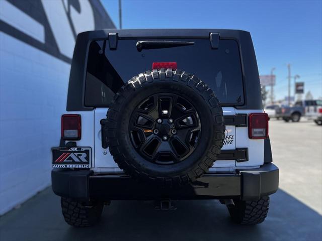 used 2016 Jeep Wrangler Unlimited car, priced at $18,491