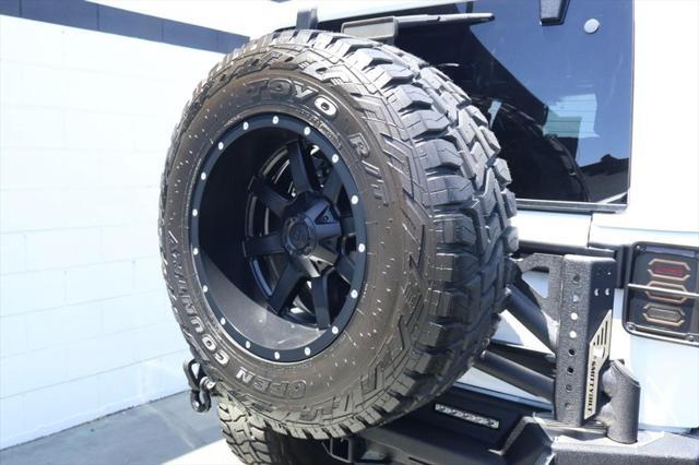 used 2015 Jeep Wrangler Unlimited car, priced at $36,991