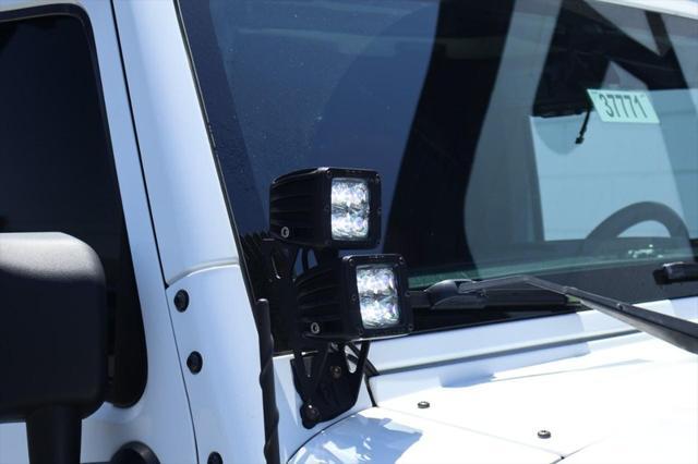 used 2015 Jeep Wrangler Unlimited car, priced at $36,991