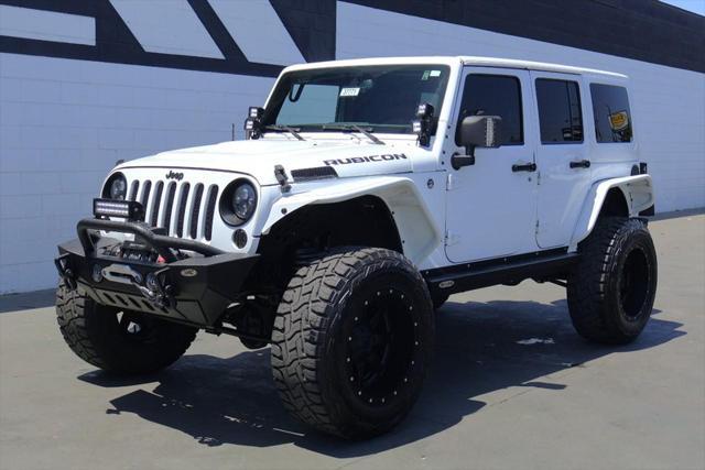 used 2015 Jeep Wrangler Unlimited car, priced at $36,991