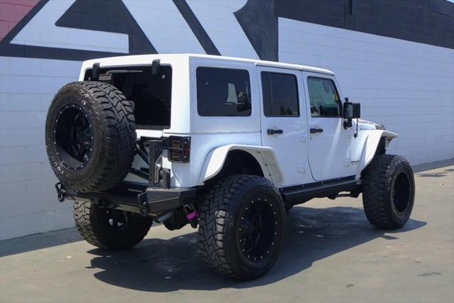 used 2015 Jeep Wrangler Unlimited car, priced at $36,991
