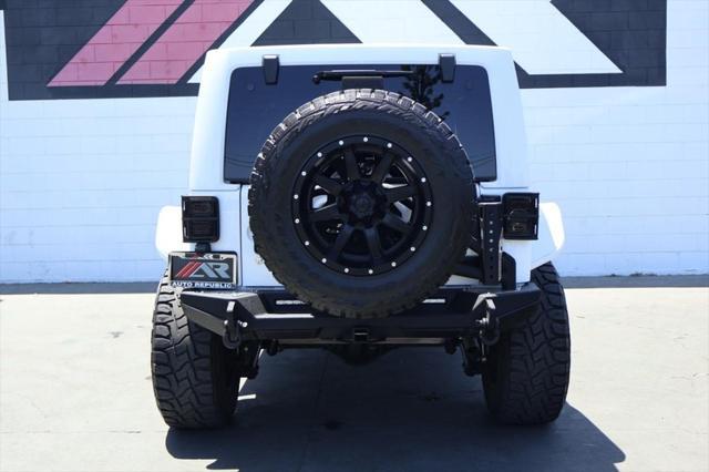 used 2015 Jeep Wrangler Unlimited car, priced at $36,991