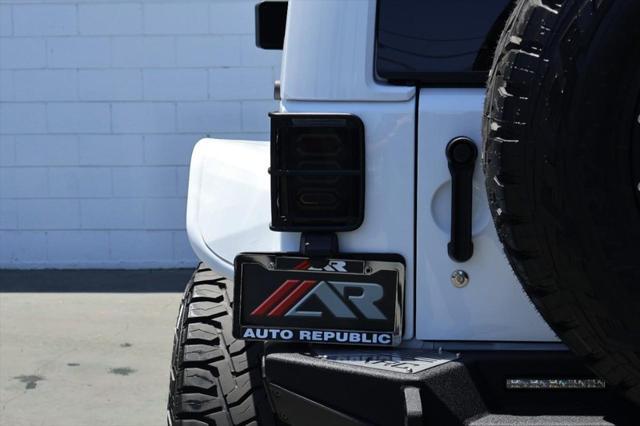 used 2015 Jeep Wrangler Unlimited car, priced at $36,991