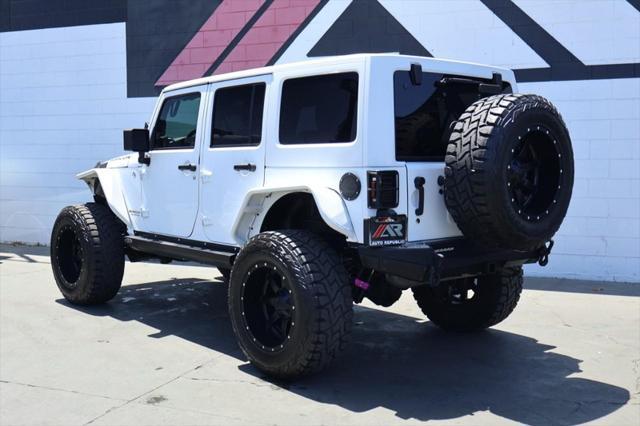 used 2015 Jeep Wrangler Unlimited car, priced at $36,991