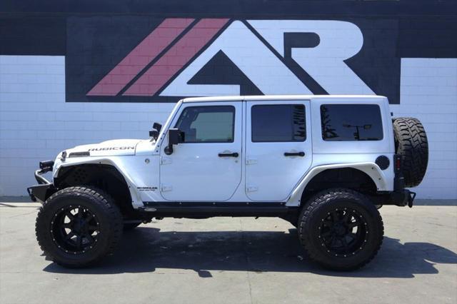used 2015 Jeep Wrangler Unlimited car, priced at $36,991