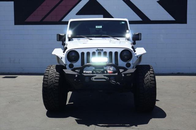 used 2015 Jeep Wrangler Unlimited car, priced at $36,991