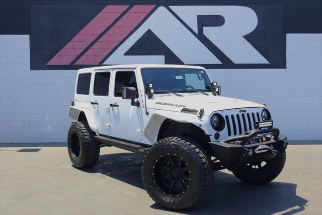 used 2015 Jeep Wrangler Unlimited car, priced at $36,991
