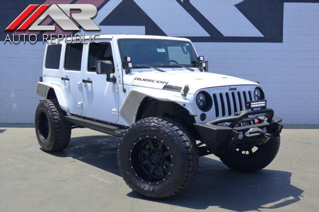 used 2015 Jeep Wrangler Unlimited car, priced at $36,991