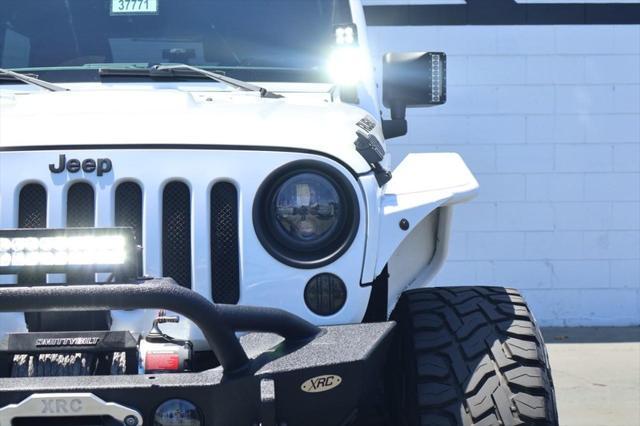 used 2015 Jeep Wrangler Unlimited car, priced at $36,991