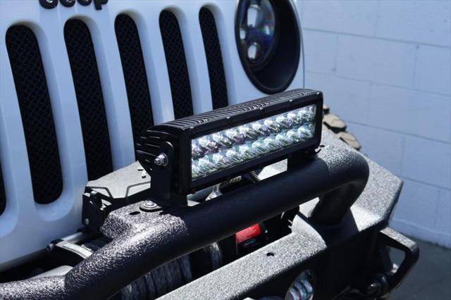 used 2015 Jeep Wrangler Unlimited car, priced at $36,991