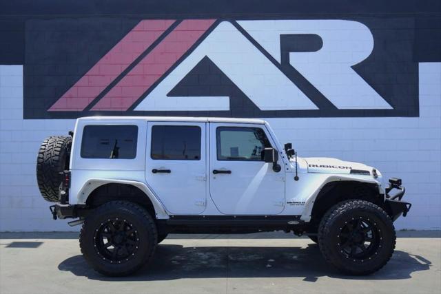 used 2015 Jeep Wrangler Unlimited car, priced at $36,991