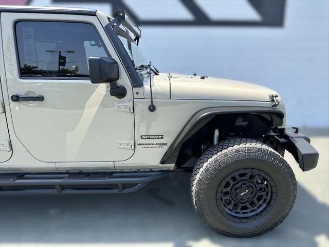 used 2018 Jeep Wrangler JK Unlimited car, priced at $22,231