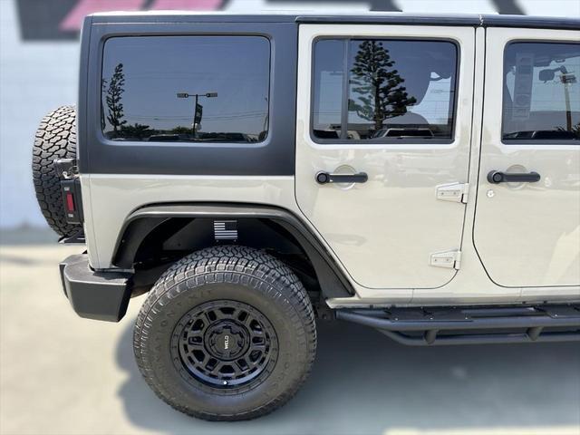 used 2018 Jeep Wrangler JK Unlimited car, priced at $22,231