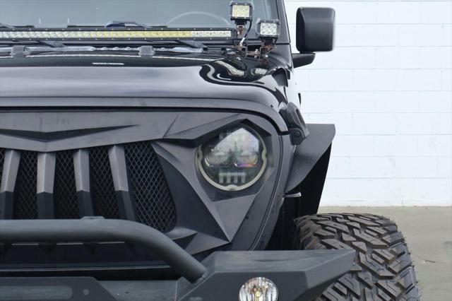 used 2018 Jeep Wrangler Unlimited car, priced at $33,991