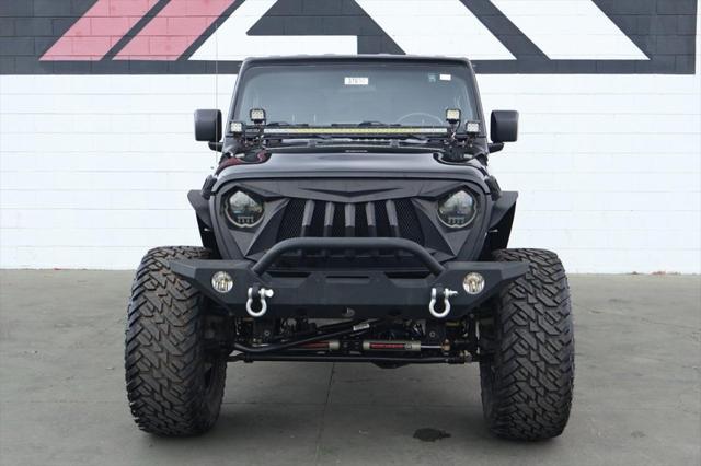 used 2018 Jeep Wrangler Unlimited car, priced at $33,991
