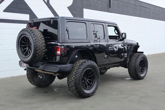 used 2018 Jeep Wrangler Unlimited car, priced at $33,991