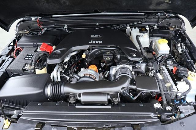 used 2018 Jeep Wrangler Unlimited car, priced at $33,991