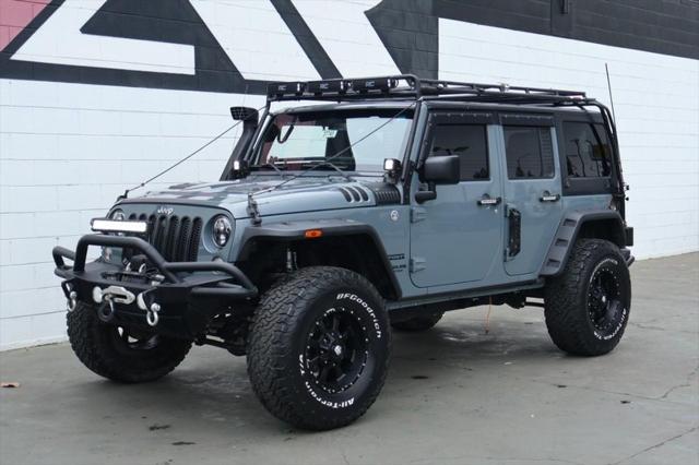 used 2015 Jeep Wrangler Unlimited car, priced at $26,991