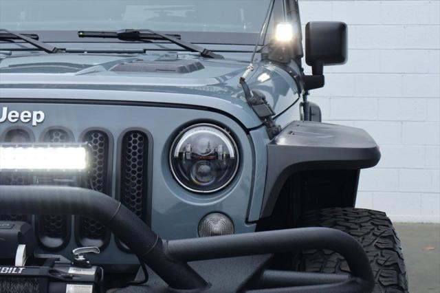 used 2015 Jeep Wrangler Unlimited car, priced at $26,991