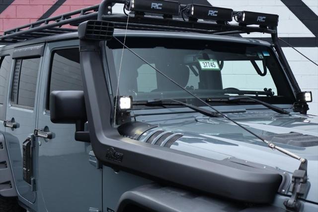 used 2015 Jeep Wrangler Unlimited car, priced at $26,991
